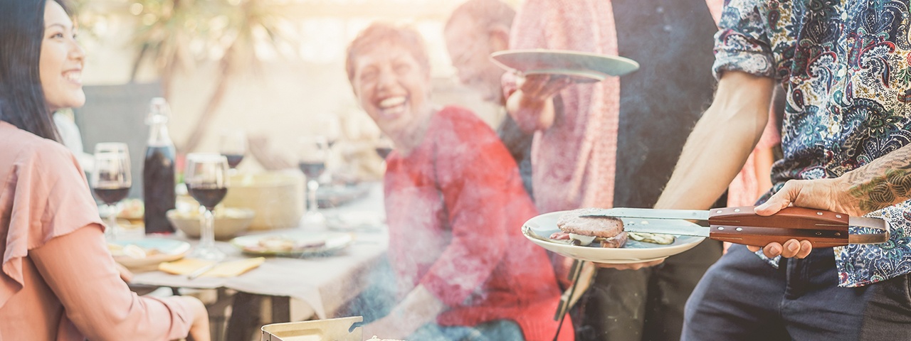 Man cooking meat on a bbq