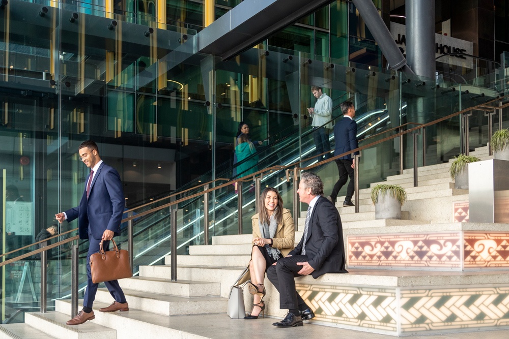 Delegates on stairs.