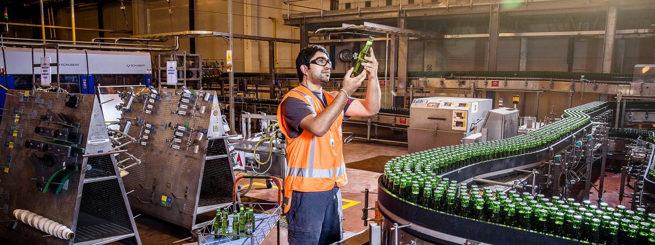 Man in bottle factory (credit: ATEED/ Todd Eyre)