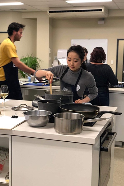 Sayan cooking at Auckland Seafood School